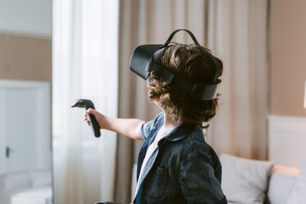 a boy with a virtual reality headset